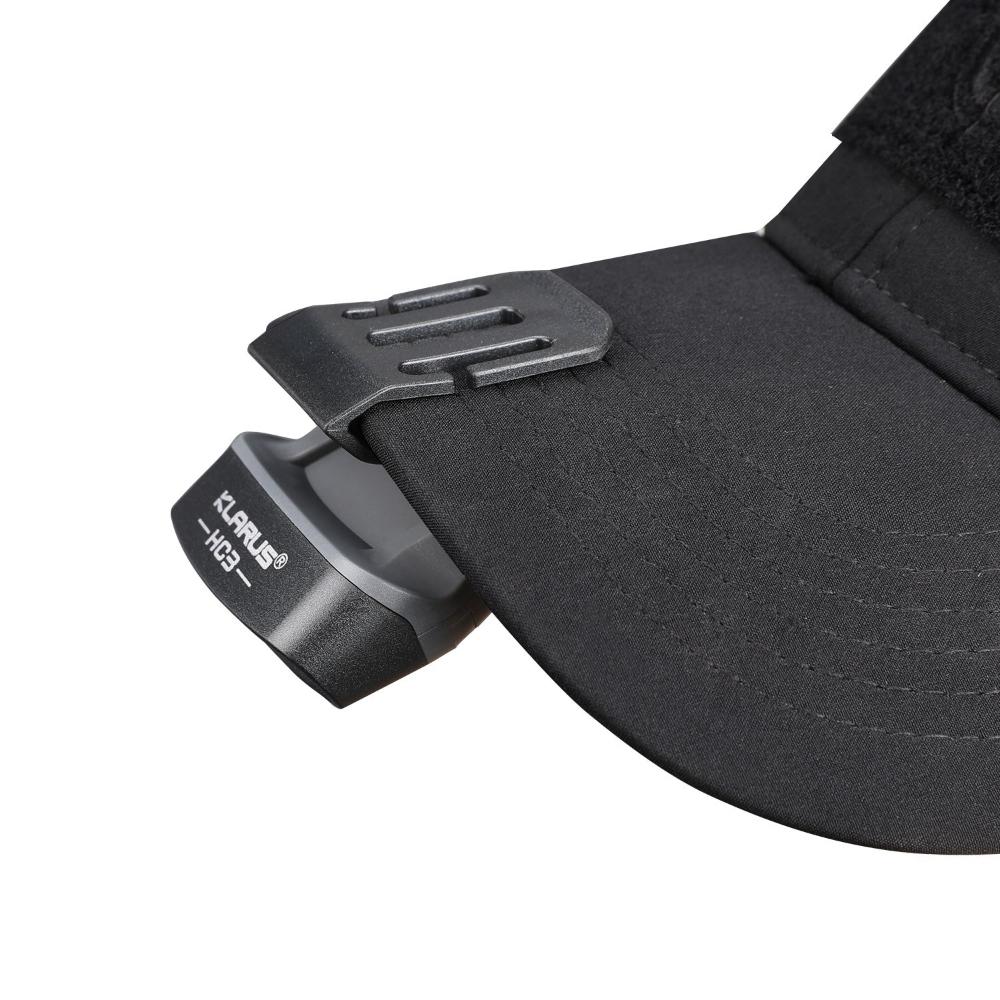 Klarus HC3 Headlamp showing secure clip on a hat